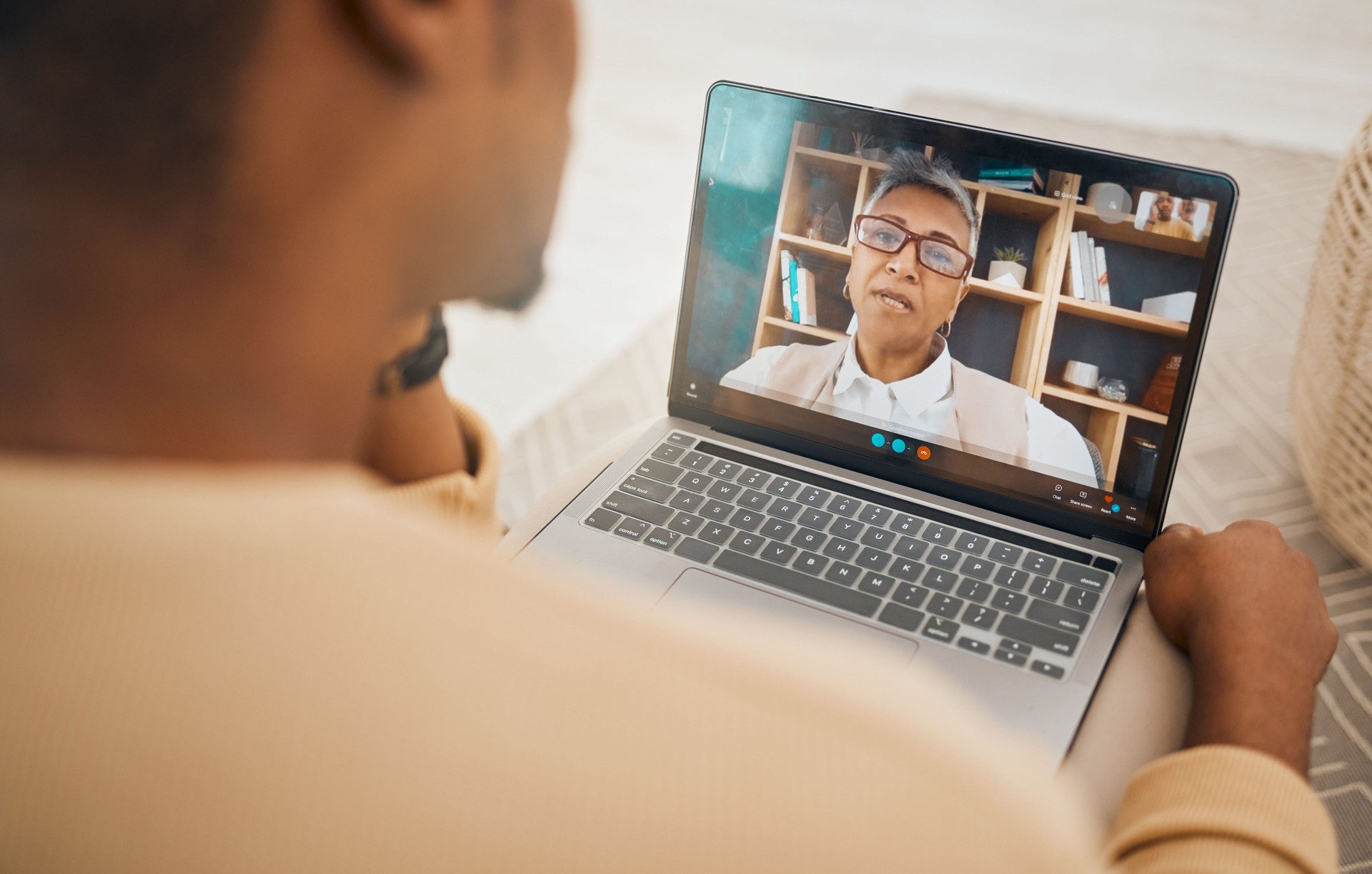 Laptop, video call and mental health with virtual counseling consultation, doctor and patient with communication Psychologist, depression and people talk of trauma and anxiety, support and trust